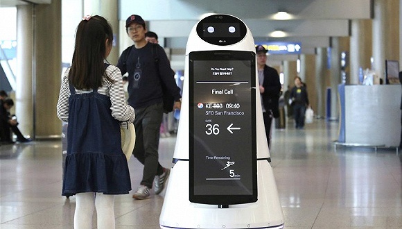 "小v姐妹"入驻上海帝盛酒店 百分百中国制造的服务机器人什么样?