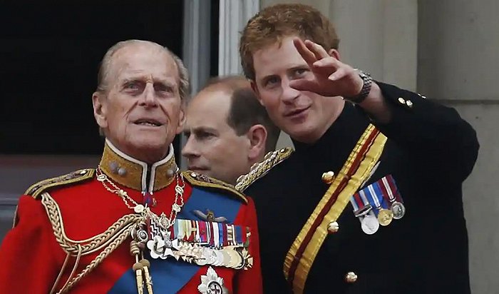 Prince Harry with his grandfather Prince Philip in 2014