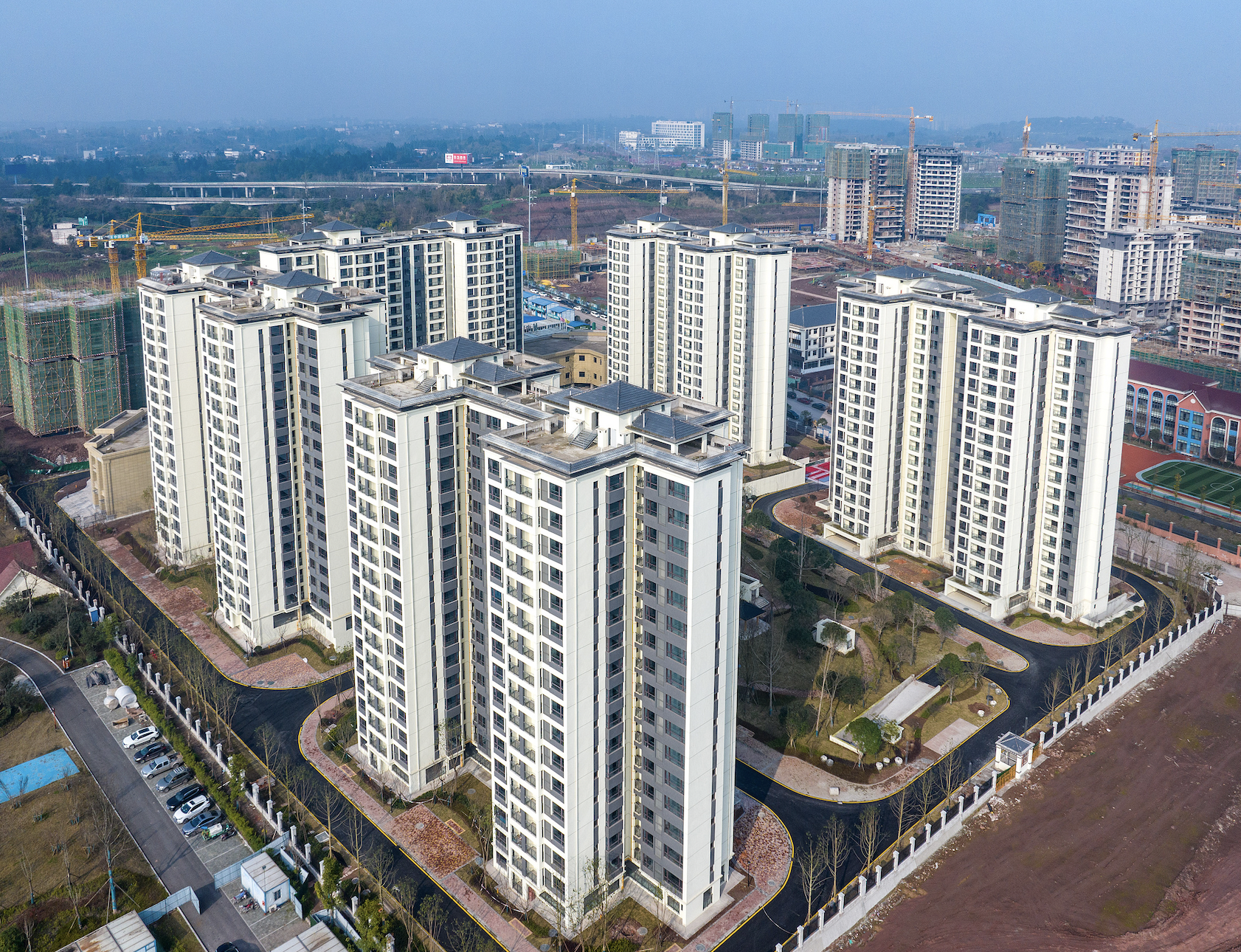 起草组成员解读政府工作报告，首次把稳住楼市股市写进总体要求